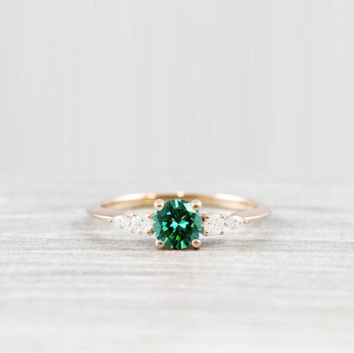 diamond ring with green stone