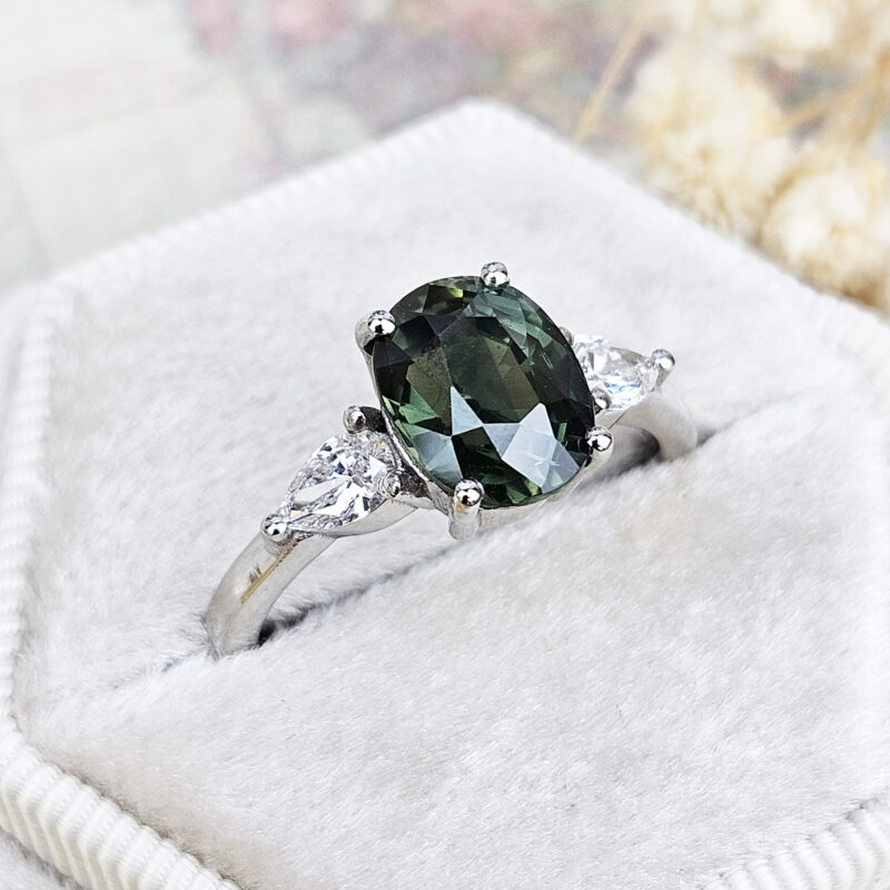 Reveniss: Intricate Oval Blue-Green Sapphire Ring | Ken & Dana Design